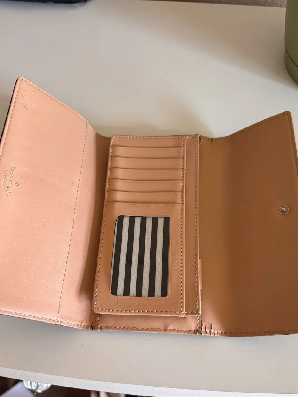 kate spade Black Pebbled Leather Fold Wallet with Gold Logo